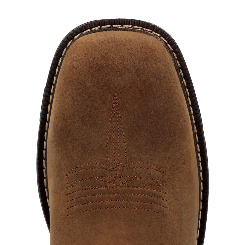 Close-up of a brown leather boot sole with stitching detail on a white background