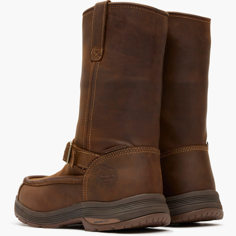 Pair of brown leather boots on a white background